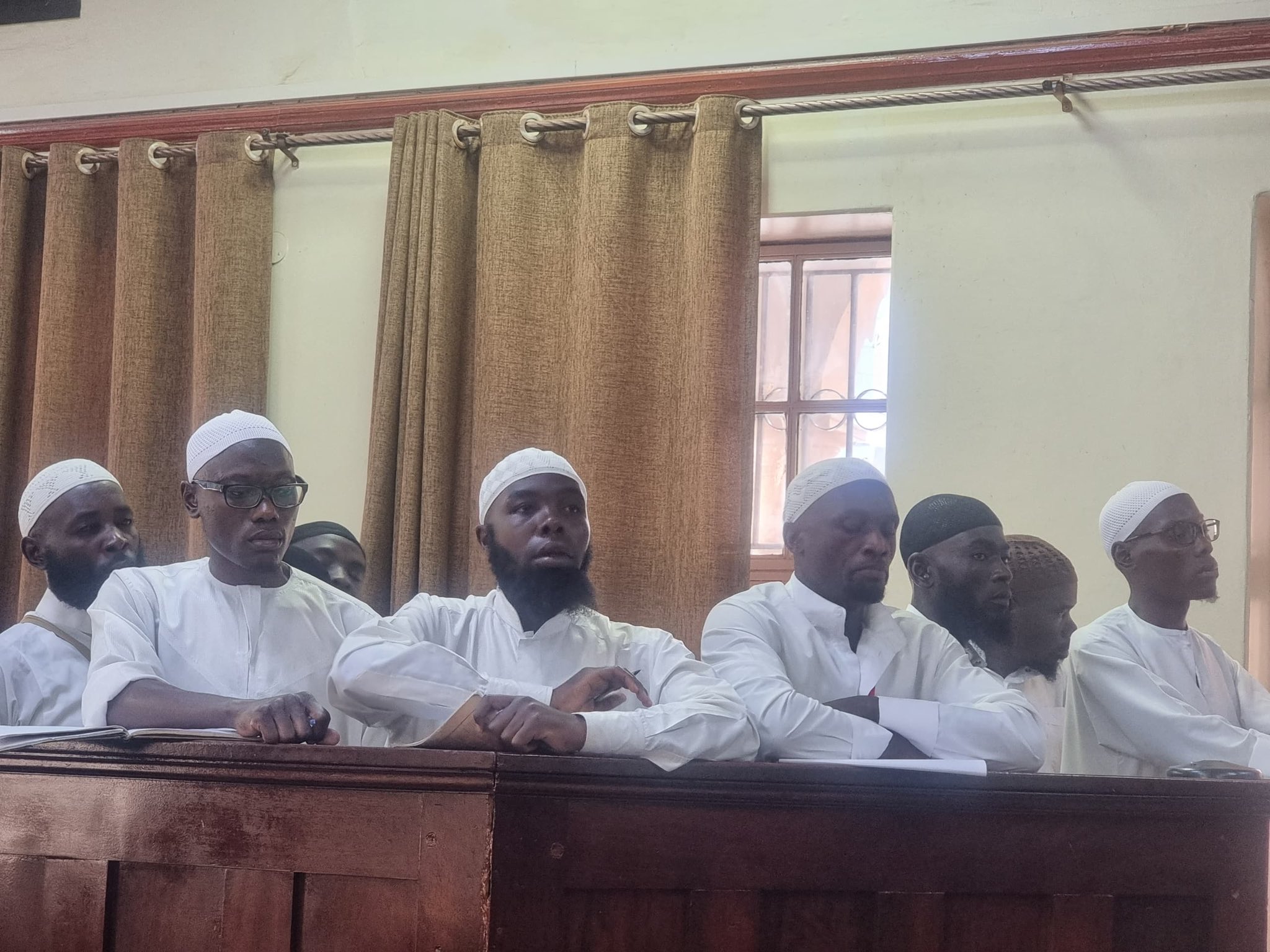 The nine accused in the Susan Magara case in the dock at High Court