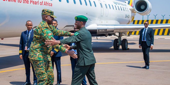 Military officials shaking hands at a formal diplomatic reception