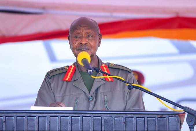 President Museveni addressing returnees at a national event