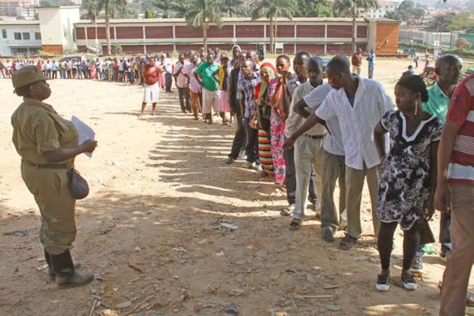 A police officer standing near a polling station
