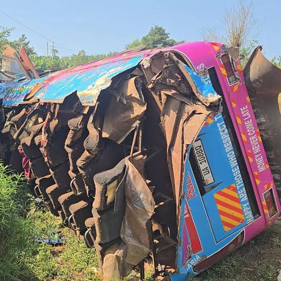 A school bus parked on a rural Ugandan road